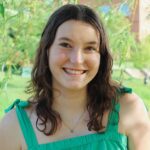 Emily Rice '24, Shenandoah University psychology major, photo portrait. Wearing green sleeveless dress. 
