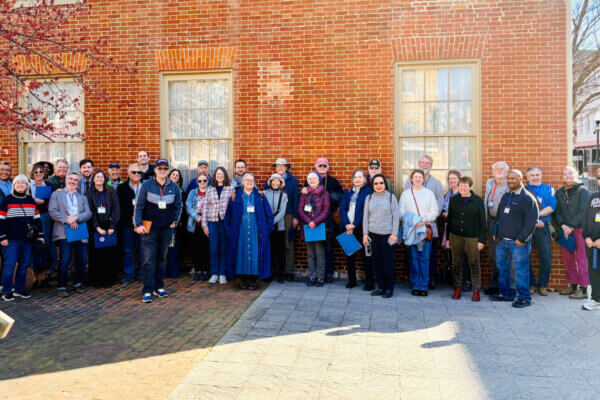 Group photo of participants on the walking tour during the Virginia Forum.