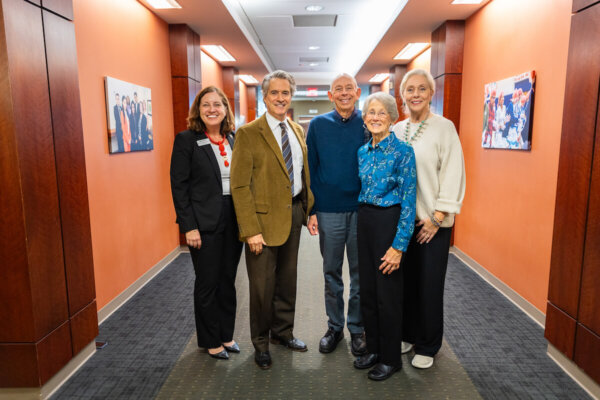 Karen Abraham, provost; Giles Jackson, associate professor and director of the Institute for Business, Sustainability and Society; David Baxa; Lynn Baxa; and Astrid Sheil, dean of the business school, pose for a photo