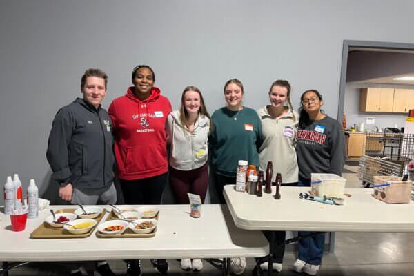 Group of student volunteers with WATTS