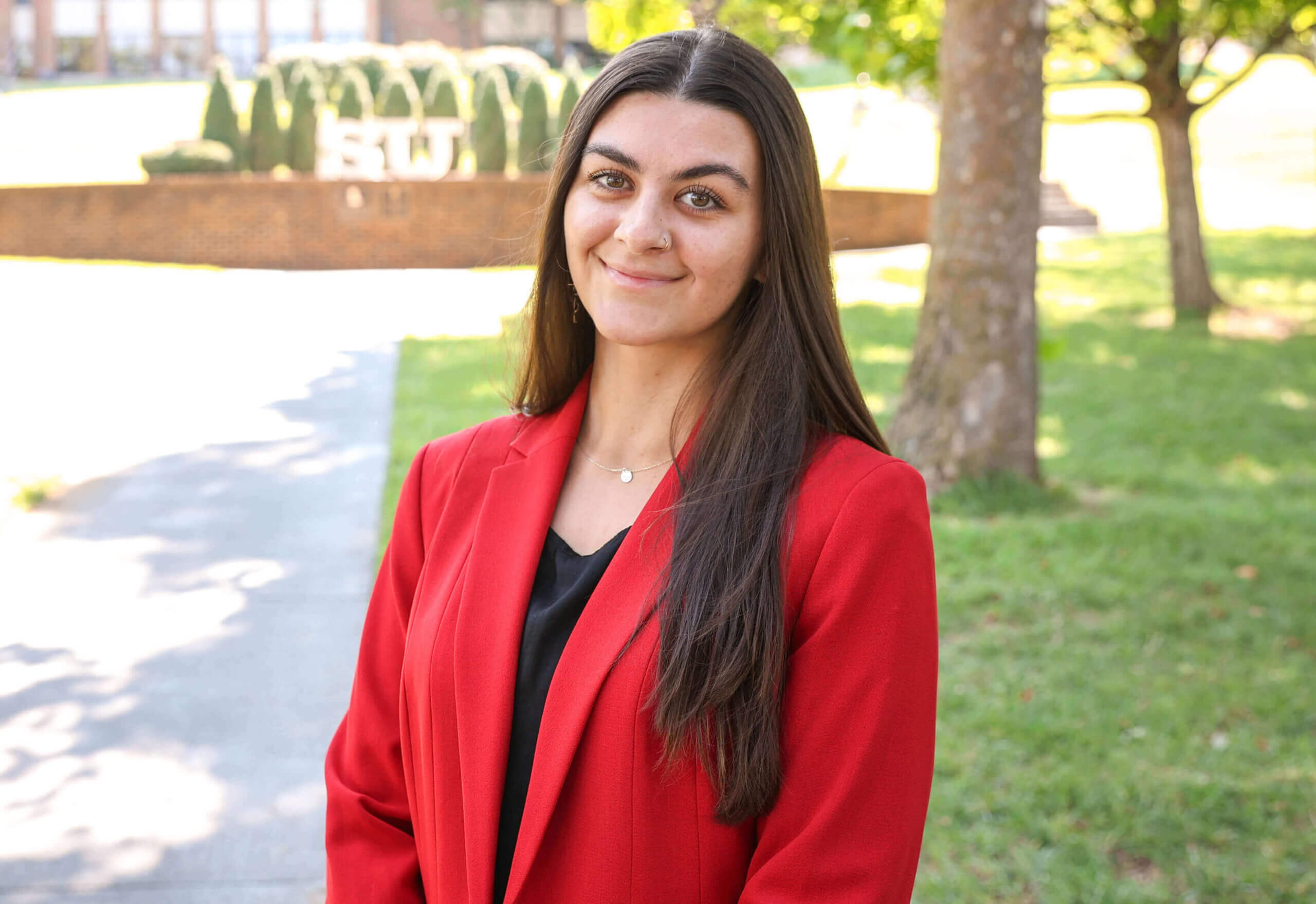 professional headshot of Emily Luzier