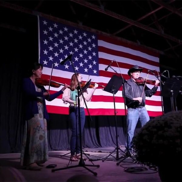 Violinists Mullen ’26; Sexton ’97, ’10; and Takayama Perform at Bluegrass Festival