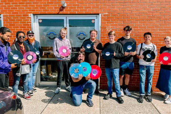 Students Experience Vinyl Manufacturing at Blue Sprocket Pressing