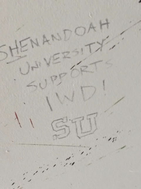 Wall art reading Shenandoah University supports IWD 