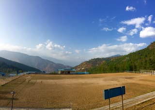 View of Bhutanese fields and mountains