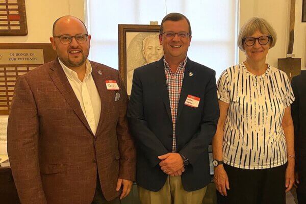 McCormick Civil War Institute director Jonathan Noyalas '01, M.A. (center) awarded for work in African American history. He received his recognition with 2024 Virginia Teacher of the Year Jeff Keller (left) and former Harvard President Drew Gilpin Faust, Ph.D. (right)