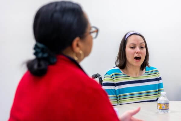 Staged photo of a client being worked with as part of Shenandoah University's free Speech, Language and Hearing Clinic in Loudoun.
