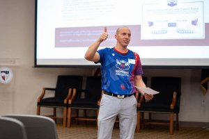 Shenandoah University Esports Program Director Joey Gawrysiak, Ph.D., shown as he makes a presentation.