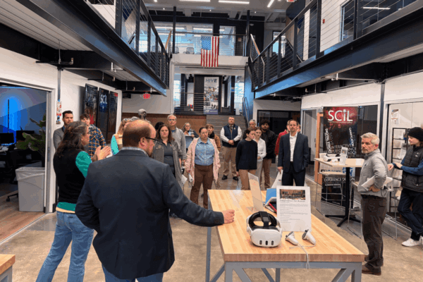 Shenandoah faculty and staff talk to members of the U.S. Army Corps of Engineers Middle East District inside Hazel-Pruitt Armory.