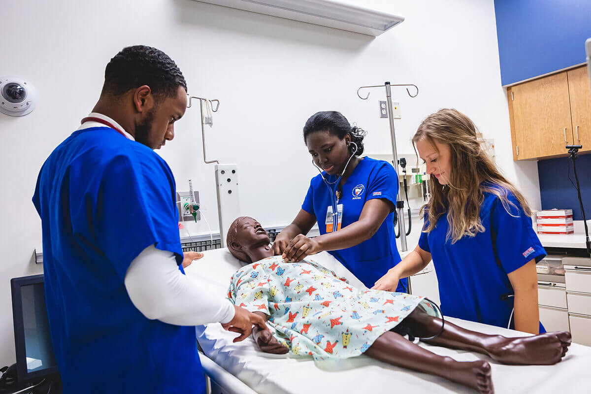 Nursing students in lab in the Cecil Pruitt, Jr. Health & Life Sciences Building