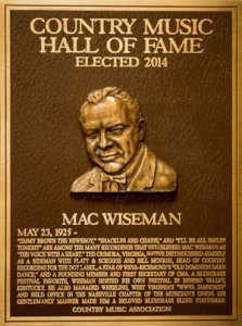 The Mac Wiseman Hall of Fame plaque is displayed in the Country Music Hall of Fame in Nashville, Tennessee.