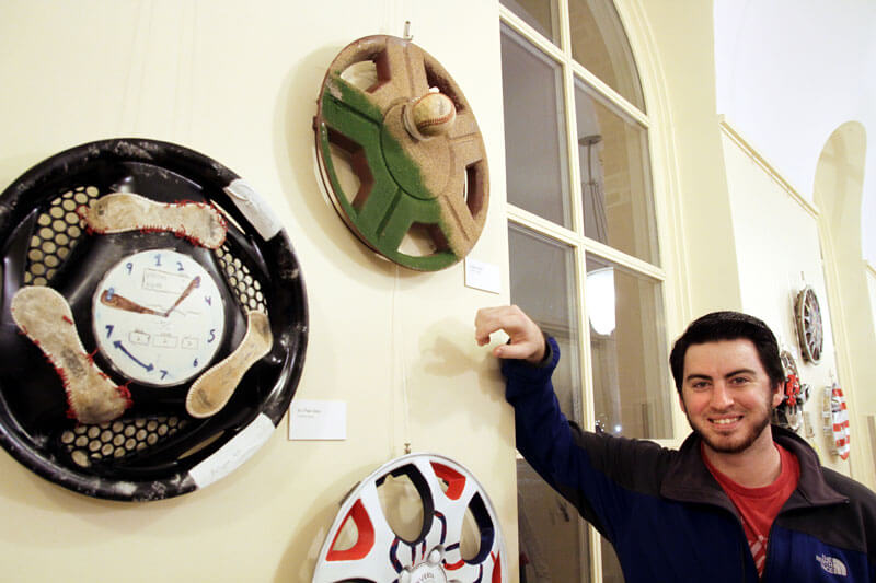 Art Imitates Life in Recycled Hubcap Art Exhibit