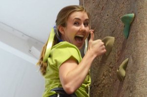 A girl rock-climbing