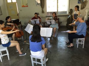 Shenandoah University viola professor Doris Lederer coaching chamber music students at Xi'an Festival