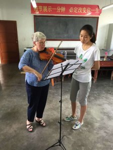 Doris Lederer, Shenandoah professor of viola, demonstrating an idea to students in Xi'an festival-2