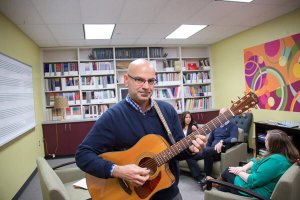 Ray Leone, Shenandoah Maste of Music Therapy Student conducting ICU study for which he won a graduate research award