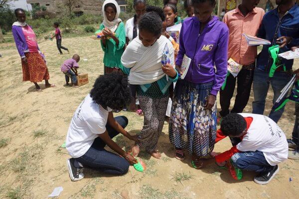 Shenandoah University pharmacy student Mearg Tareke returns to Ethiopia to distribute shoes and school supplies through her organization, Walk With Me.