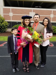 Nazila Raofi Salamkhail ’17 with her family at graduation from Shenandoah University's Bernard J. Dunn School of Pharmacy. 