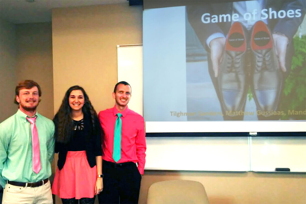 Business School Students Excel at Business Strategy Game John Sanders, Amanda Loranger, and Matthew Gussiaas earn high rankings in nationwide competition