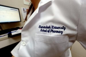 Shenandoah University pharmacy white coat image.
