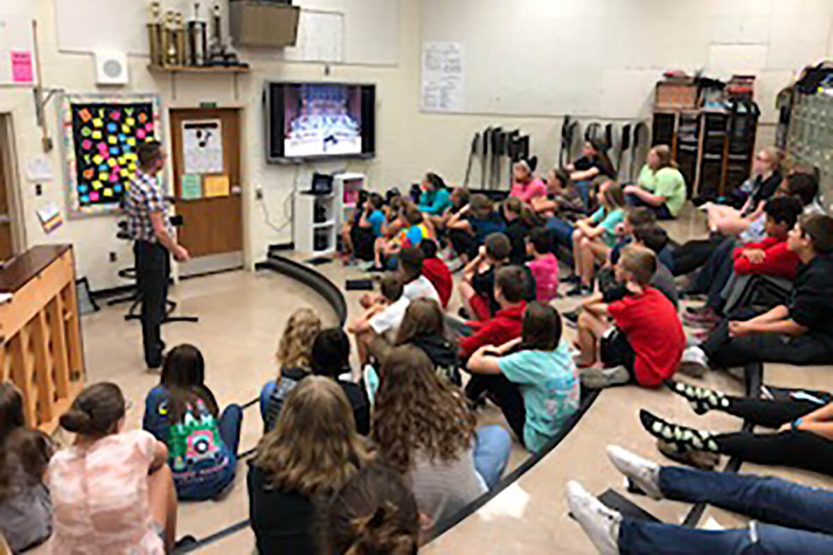Oltman Shares Professional Insights with Students at Robert E. Aylor Middle School