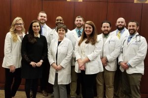 Shenandoah pharmacy students at legislative day. Photo features faculty member Sarah Parnapy Jawaid second from left in the front row.