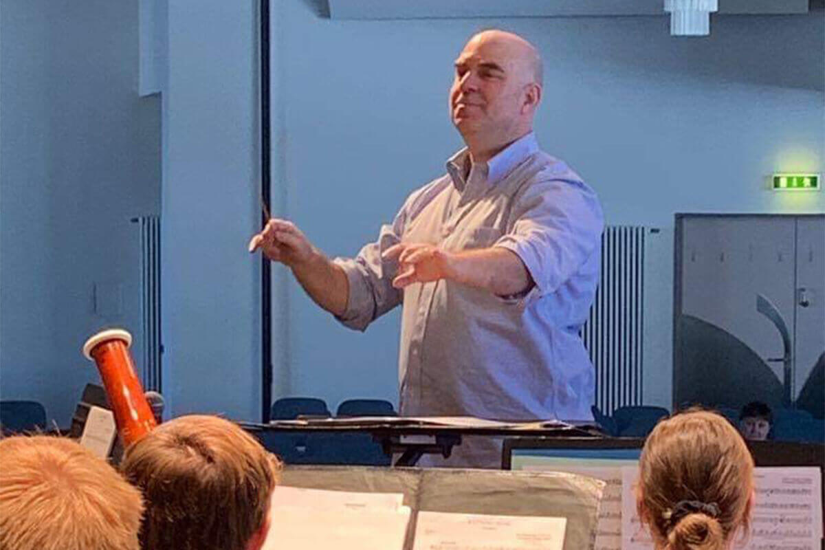 Robblee Conducts DoDEA-Europe Honors Music Festival Band and Completes Residency in Brussels