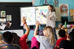 Shenandoah University Psychology Professor Laura K. Zimmermann, Ph.D., talking about mushrooms in a class of second-grade students at Quarles Elementary School in Winchester, Virginia, on Earth Day, April 22, 2022.