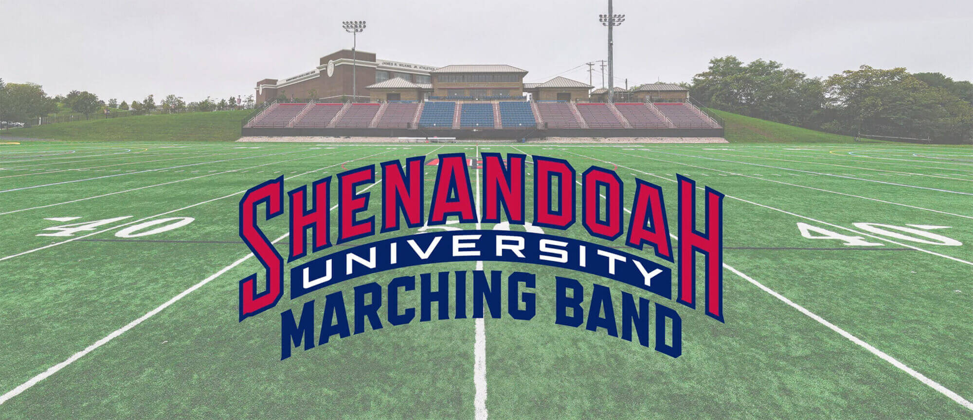 Marching Band logo on Aikens Field background