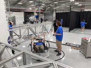 Shenandoah University's Wes Brown, immersive technology specialist, and VR design student Luke Yager participate in the NASA astronaut training workshop at the Kennedy Space Center