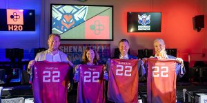 H20 CEO Martijn van der Craats, Shenandoah University President Tracy Fitzsimmons, Provost Cameron McCoy and Dean of the School of Business Astrid Sheil display their custom SU esports jerseys
