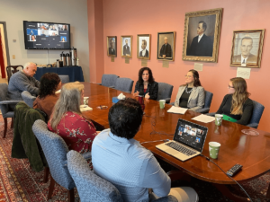 Shenandoah University Associate Provost Amy Sarch, Professor of Criminology and Criminal Justice Staci Strobl and Cardiff University Lecturer in Climate Science Sammy Buzzard meet with other members of Shenandoah University faculty and staff during Buzzard's visit to Winchester in October 2022