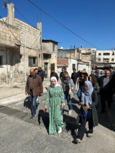 Members of the Zero Hunger teams at Shenandoah and Yarmouk universities walk a street in Jordan