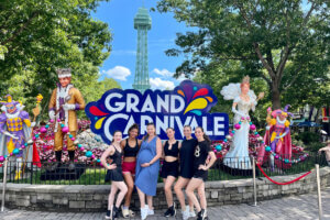 Sarah Mawyer Ridenhour with dance students and alumni at Kings Dominion park