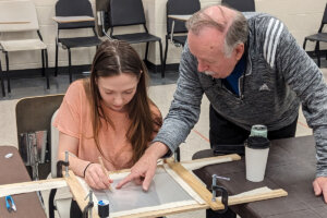 Robert Haven works with theatre student in masterclass