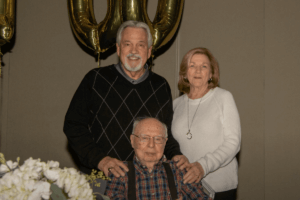 Shenandoah alumnus Charles “Cy” L. Maulden ’47 (center, seated) at his 100th birthday party in December in North Carolina.