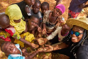 Shenandoah graduate Violet Amoabeng ’09, ’11, in a community in Ghana where she sources some of the ingredients used in her company's Skin Gourmet products.