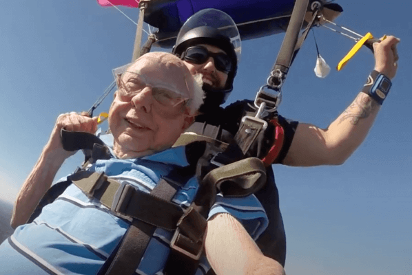 Shenandoah alumnus Charles “Cy” L. Maulden ’47 tandem skydiving - his first jump occurred when he was 93 years old. 