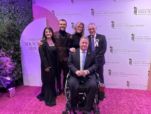 Shenandoah University graduate Grant Taylor '20, his stepfather Scott Spitnale, and their family at 33rd annual Shock Trauma Heroes Celebration on Nov. 18, at the Joseph Meyerhoff Symphony Hall in Baltimore, Maryland.