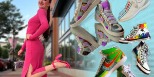 Myklin Davis shoes artist strikes a pose with her original creations