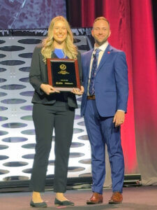 Sheridan Herron receives her award for winning the APhA-ASP National Patient Counseling Competition.