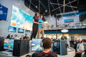 Competitors and broadcasters during the Boost on the Beach event.