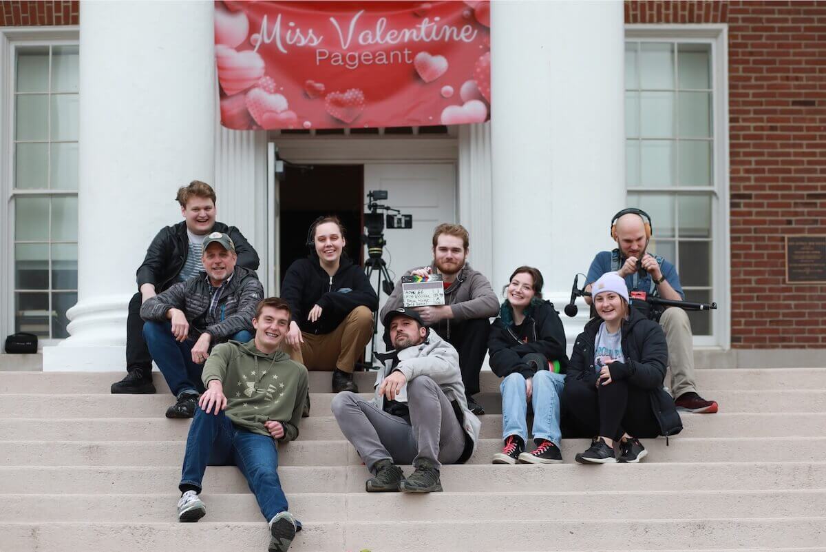 Shenandoah students take a break from filming a scene for "Miss Valentine" on the front steps of John Handley High School.