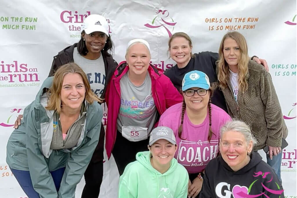 A group of Girls on the Run volunteers posed for a photograph