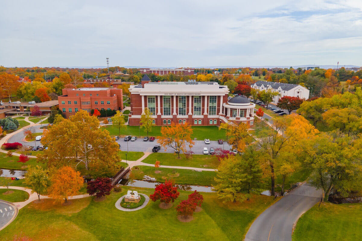 Aerial photograph of Pruitt Health & Life Sciences Building in the fall.