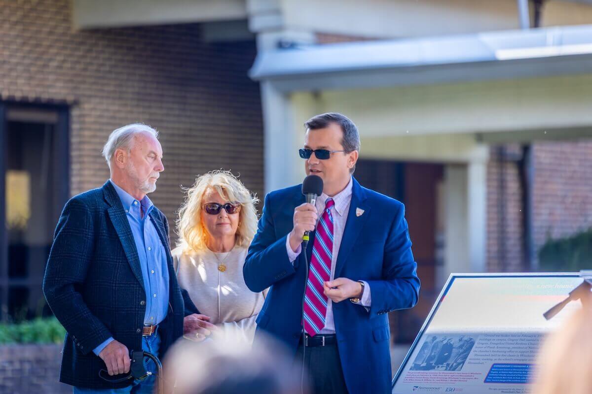 Jonathan Noyalas reads from one of Shenandoah University's new historical markers.