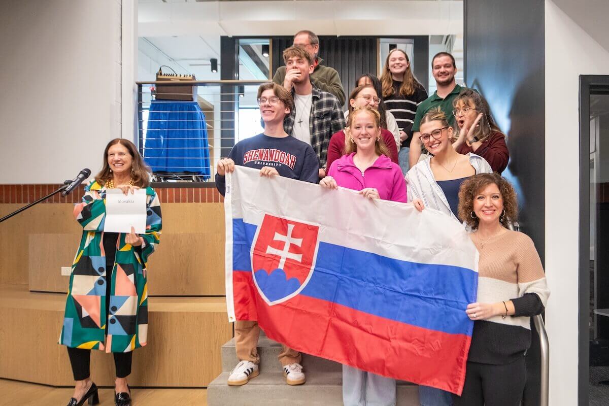 Shenandoah students and faculty hold the Slovakia flag.