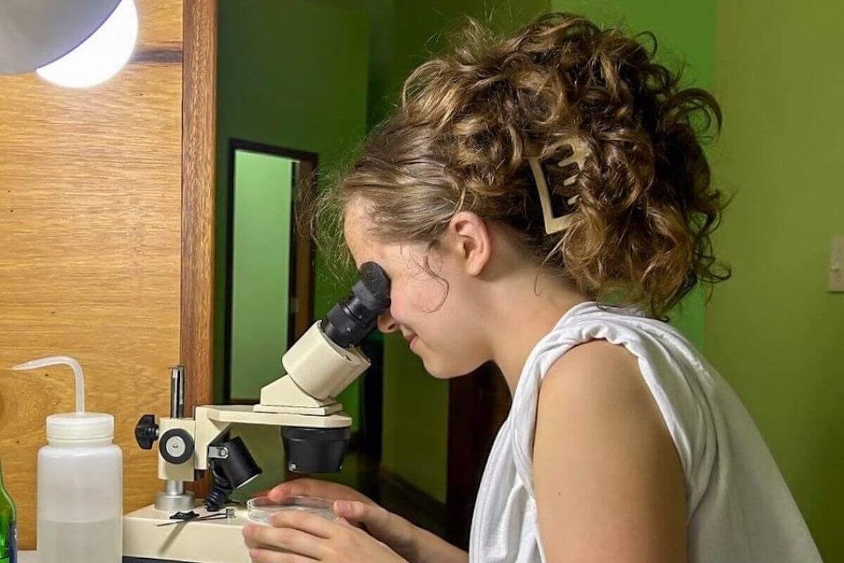 Shenandoah University student Sophie Koutalakis '26 conducts research during her summer 2025 internship in Belize coordinated by Toucan Education.