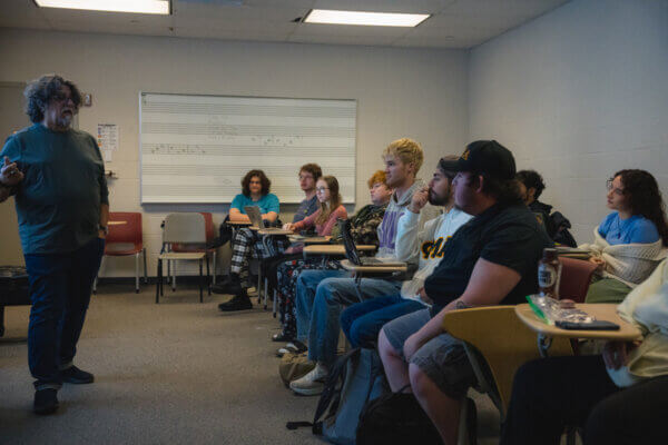 Dan Navarro with music students