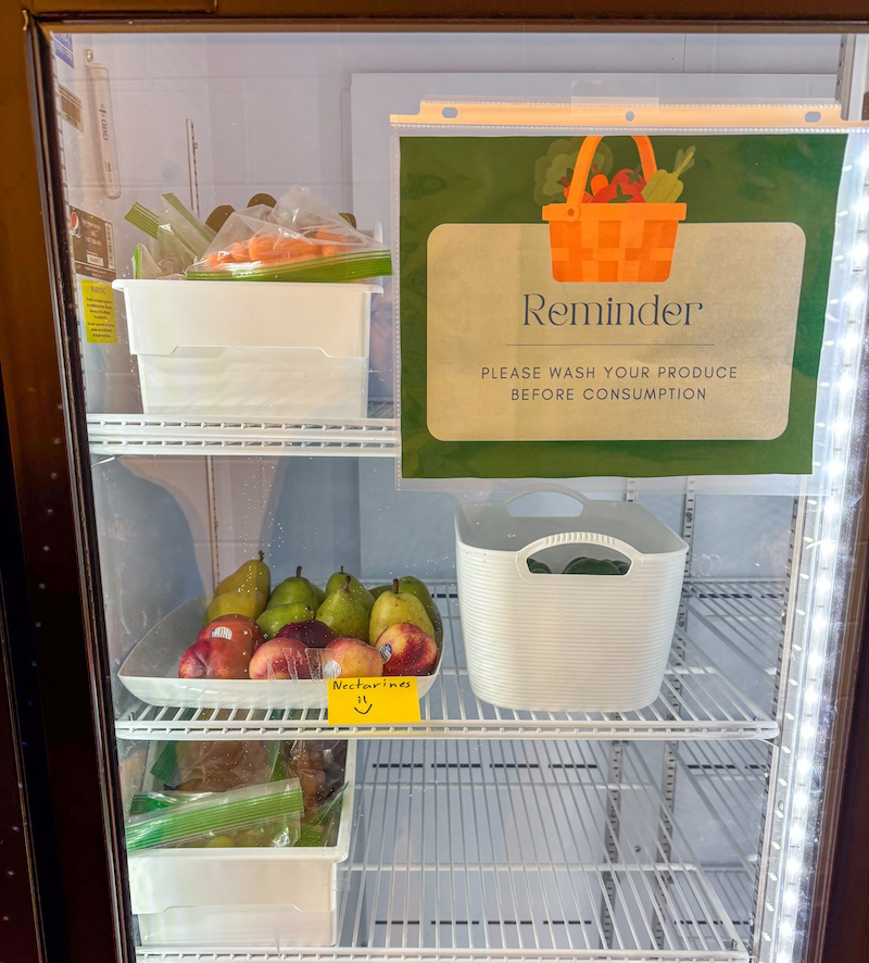 Buzzy's Food Pantry freezer stocked with produce.